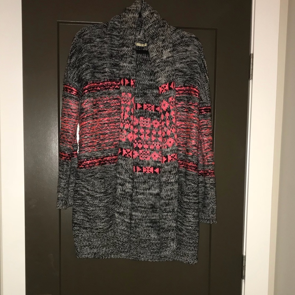 Open pink and black sweater